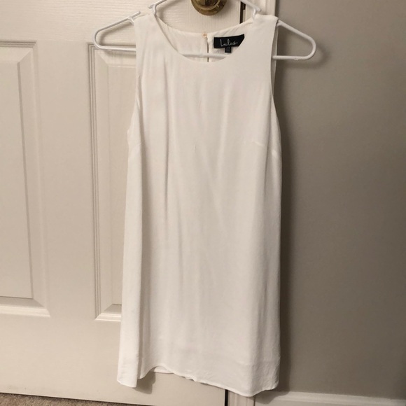 white sleeveless shift dress